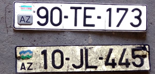 Zibilin içindən avtomobil nömrələri, bank kartları tapıldı