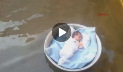 58 nəfərin öldüyü seldə uşaq belə sağ qaldı