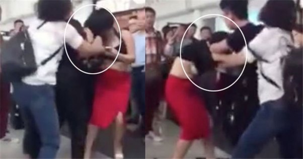 Qadın ərinin sevgilisini hava limanında döyüb soyundurdu