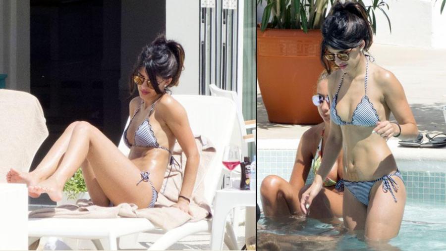 Aktrisa hovuzda dincələrkən -