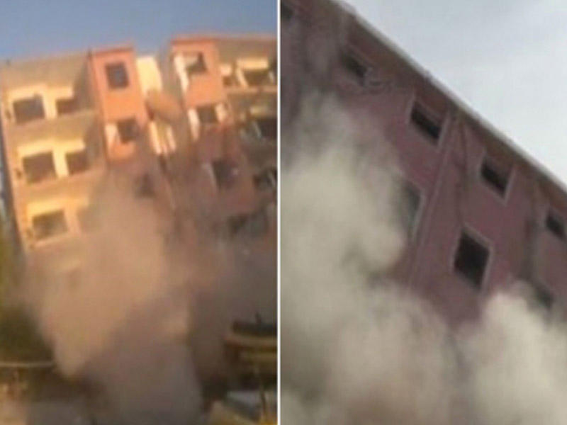 İNANILMAZ: Atdığı daşla 5 mərtəbəli bina çökdü - VİDEO