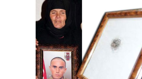 Şəhid anasının saçı tablo oldu - FOTO