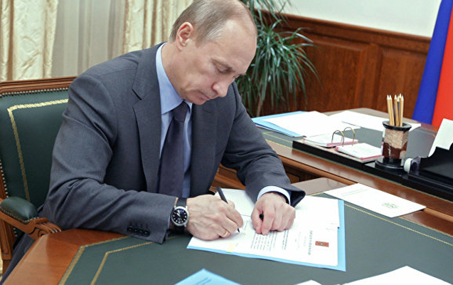 Putin o qanunu imzaladı