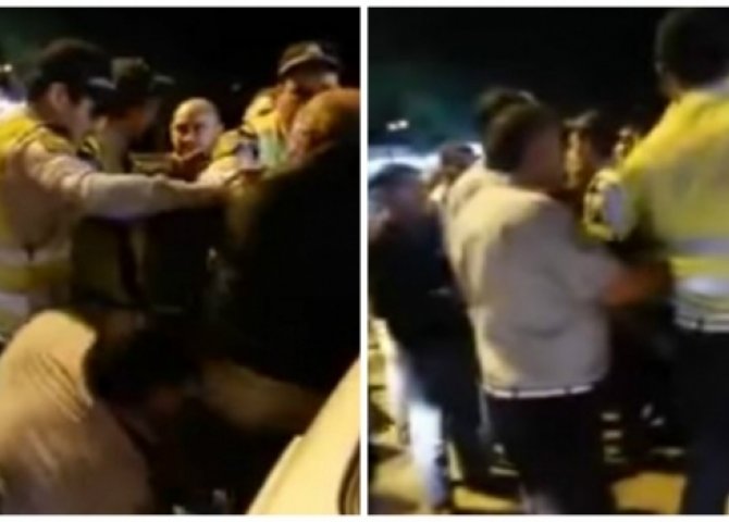 Sürücü ilə yol polisi əməkdaşları arasında dava - VİDEO