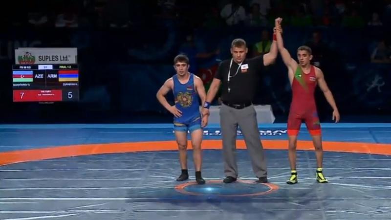 Güləşçimiz erməni rəqibini məğlub edərək dünya çempionu oldu - VİDEO