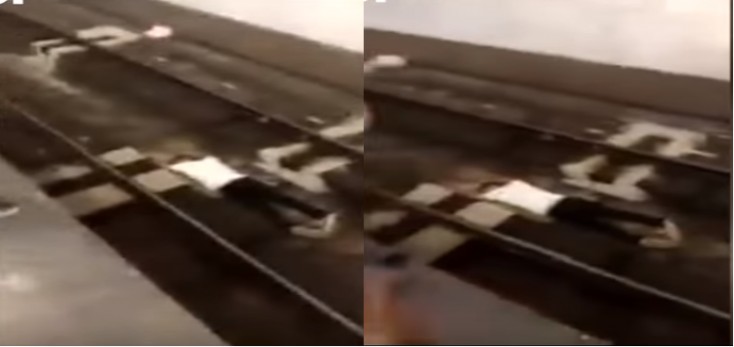 Bakı metrosunda dəhşətli anlar - Relsin üstünə uzandı - VİDEO