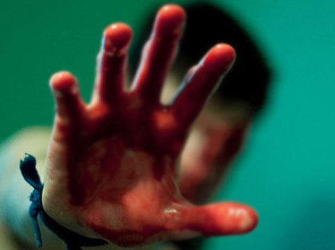 Dostlarını öldürən şəxslərdən birinin cəzası azaldıldı