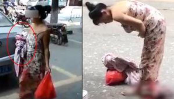 Qadın küçədə, ayaqüstə doğdu, heç nə olmamış kimi yoluna davam etdi - VİDEO