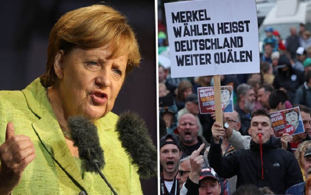 Merkel yenə pomidorla qarşılandı - Video