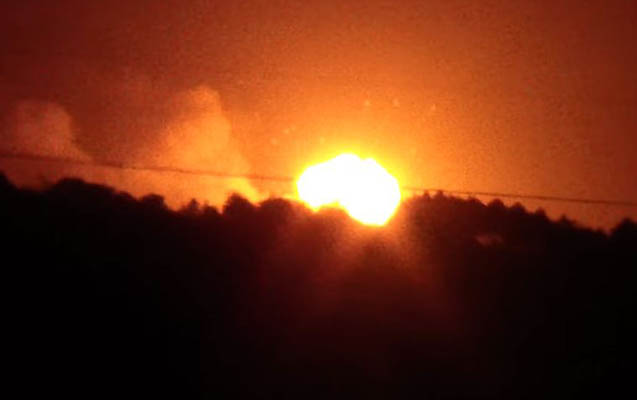 Ukraynada hərbi anbarda partlayış - Video