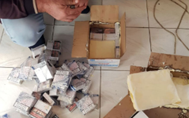 Yağ qutusundan papiros tapıldı