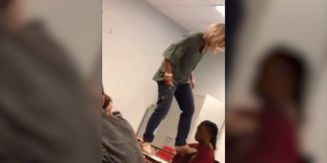 Müəllimə şagirdə təpik vurdu, saçını yoldu – Video