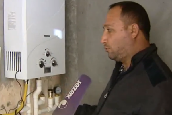 Suqızdırıcı sobadan kombi kimi istifadə edilir - qaz və elektrik sərfiyyatı azdır - VİDEO