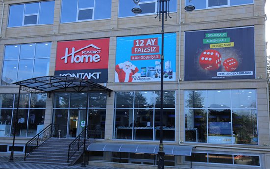 “Kontakt Home”dan biabırçılıq - Borclu qadının şəklini binalara yapışdırdılar