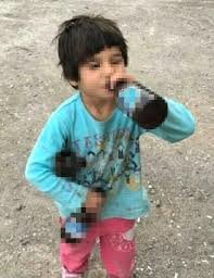 6 yaşlı qız uşağının əlində içki şüşəsi ilə fotosu yayıldı - Aidiyyatı qurumlar hərəkətə keçdi