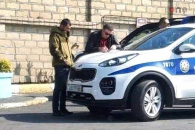 DYP əməkdaşının mülki geyimdə protokol yazmasını əks etdirən görüntülər yayılıb - FOTO