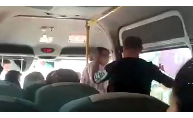 Avtobusda ərdən arvadına qarşı iyrənc hərəkət: Anbaan görüntülər - VİDEO