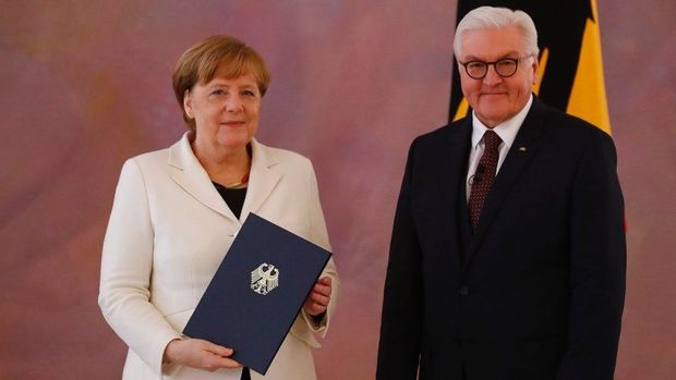 Merkel yenə titrədi - VİDEO