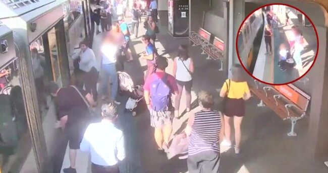 Uşağın qatarın relsləri arasına düşmə anı ANBAAN KAMERALARDA - VİDEO