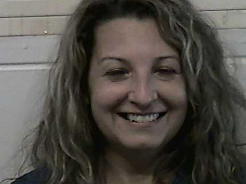 Ərini öldürən qadın polis kamerasına gülərək poz verdi - FOTO