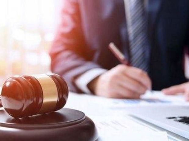 Dövlətə xəyanətdə ittiham edilən jurnalist məhkəməsi qarşısında