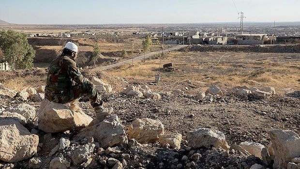 Suriyada kütləvi məzarlıq tapıldı - FOTO