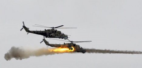 Şiddətli döyüşlər gedir: 1 helikopter vuruldu, 35 silahlı öldürüldü