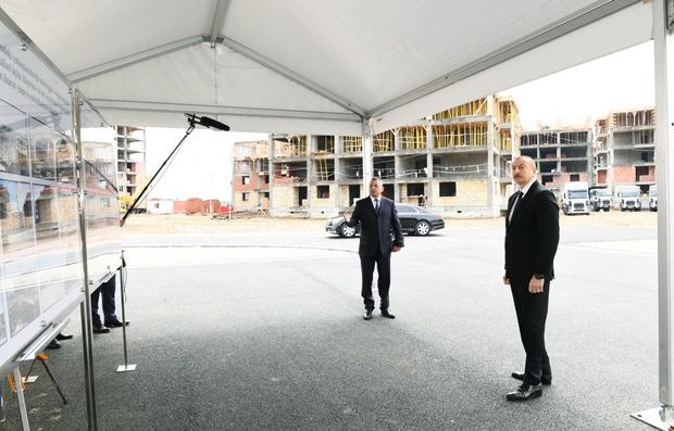 İlham Əliyev məcburi köçkünlər üçün tikilən yaşayış binalarında işlərin gedişi ilə tanış olub - FOTO