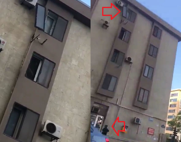 Bakıda binanın sınmış pəncərə şüşəsi təhlükə saçır - VİDEO