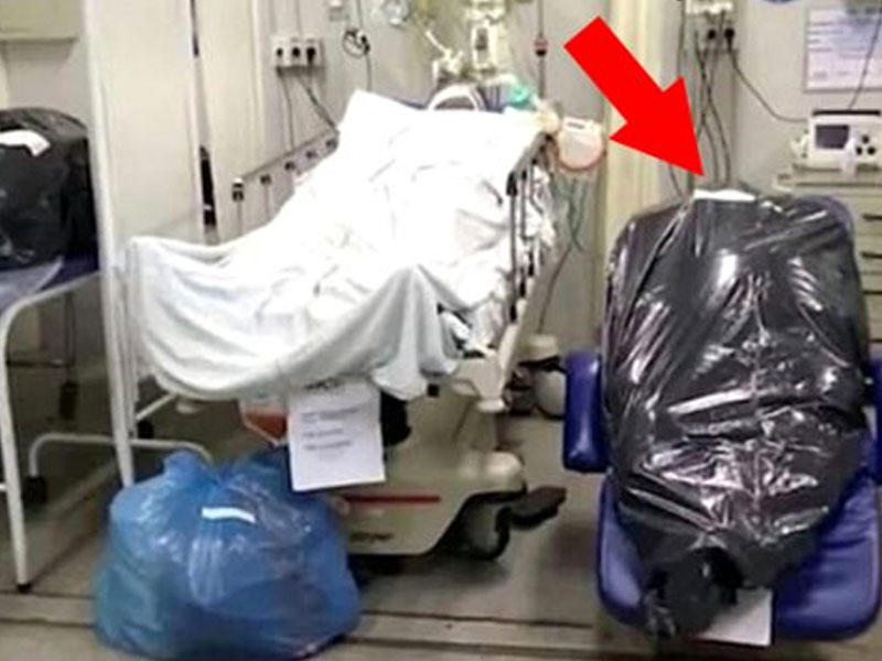 Bu ölkədə yer olmadığına görə meyitlər koronavirusdan müalicə olunanlarla eyni otaqda saxlanılır - VİDEO - FOTO