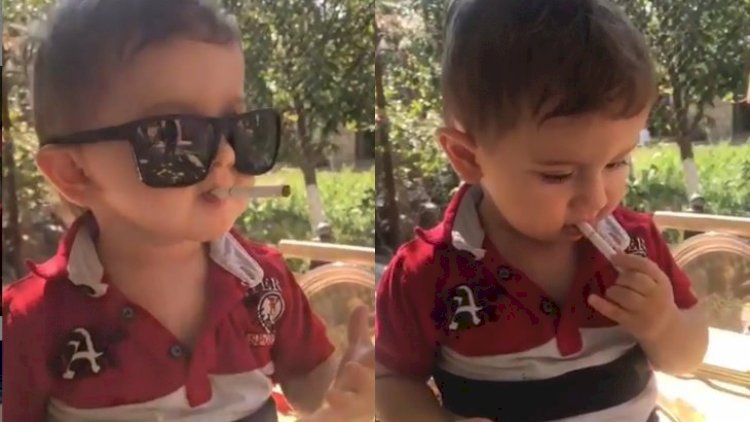 Tacir Şahmalıoğlunun bir yaşlı oğlu damağında siqaretlə... - Video