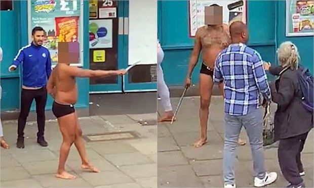 Yarıçılpaq kişi yoldan keçənləri qılıncla hədələdi - VİDEO