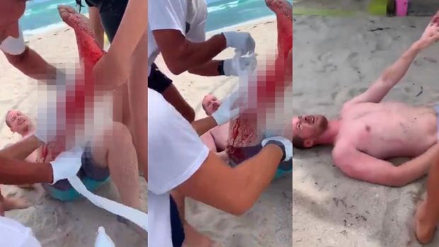 Köpək balığı dənizdə üzən turistə hücum etdi - VİDEO