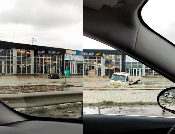 Bakıda suda batmış maşını çıxarmağa gələn evakuator da suda ilişib qaldı - VİDEO