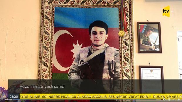 Семья шехида собралась у его могилы в день рождения героя - ВИДЕО