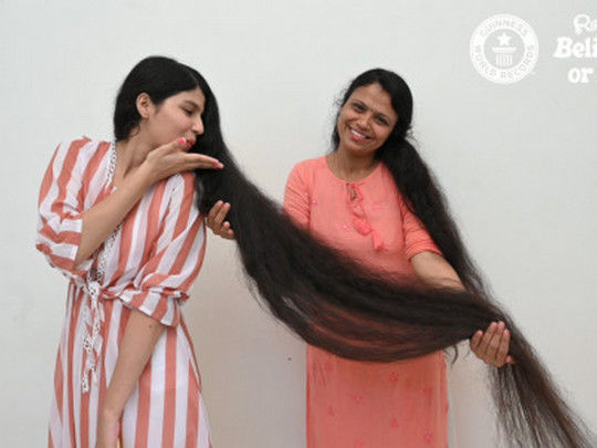 Девушка с самыми длинными в мире волосами коротко подстриглась - ФОТО