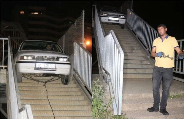 Avtomobilini piyada körpüsündən keçirməyə çalışdı, ilişib qaldı - FOTO/VİDEO