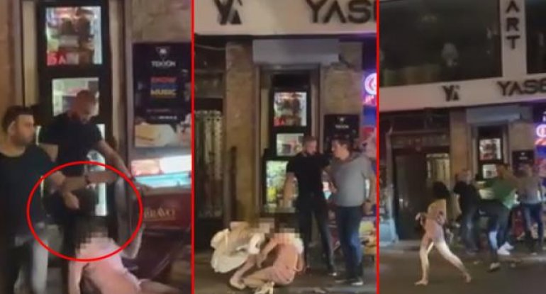 Qadını gecə klubundan sürüyərək çıxarıb döydülər - VİDEO