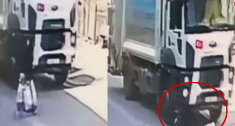 Ana və oğlu yük maşınının altında qaldı: sağ qaldılar - VİDEO