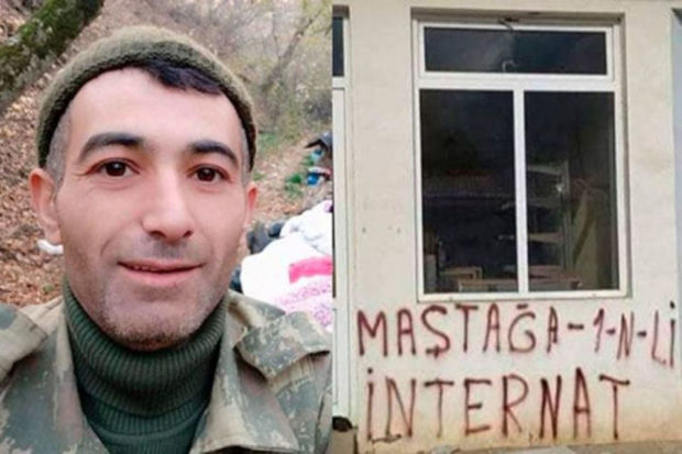 Эльчин Ахмедов, написавший на стене здания в Гадруте 