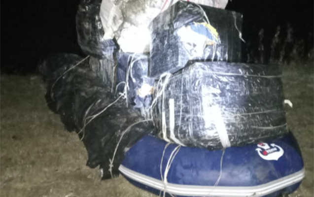 Sərhədçiləri görüb özlərini qayıqdan Kürə atdılar - Foto