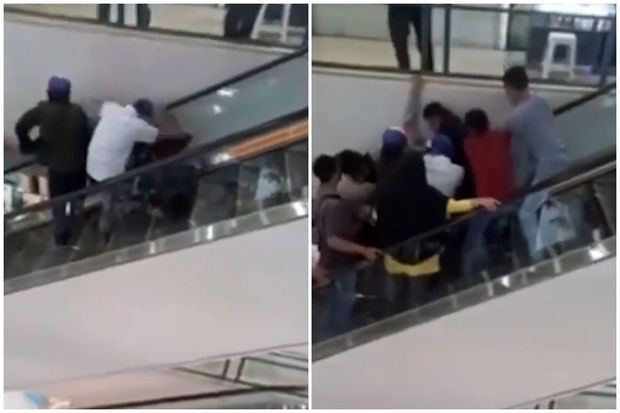 İndoneziyalı gəncin başı eskalatorda sıxışdı - VİDEO