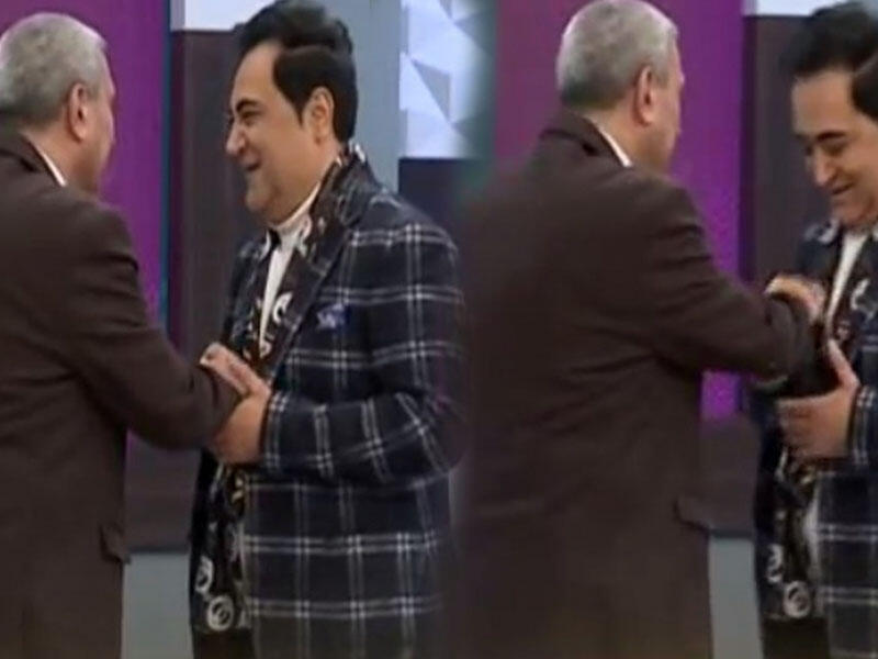 Əməkdar artist efirdə Elgizin cibinə pul qoydu - VİDEO