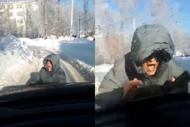 “Oskar”lıq performans: Özünü hərəkət etməyən avtomobilin altına atdı - VİDEO