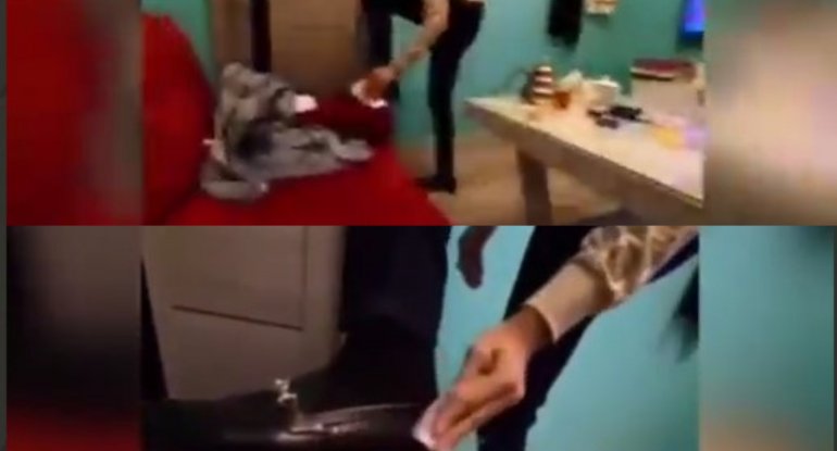 100 manatla ayaqqabısını silən şəxs kimdir? - VİDEO