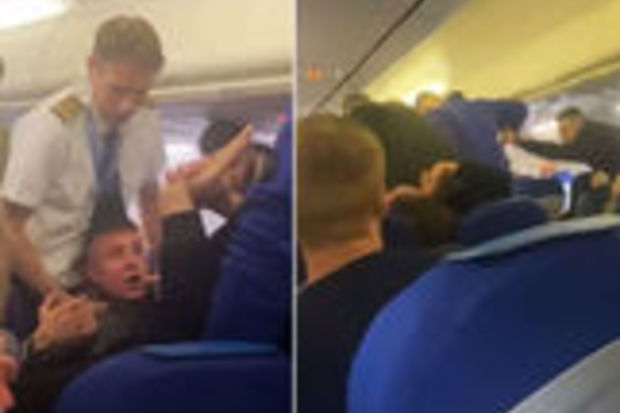 Amsterdama uçan təyyarədə sərnişinlərin kütləvi davası – VİDEO