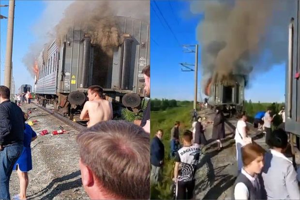 Rusiyada naməlum şəxslər sərnişinlərlə dolu vaqonu yandırdılar - FOTO/VİDEO