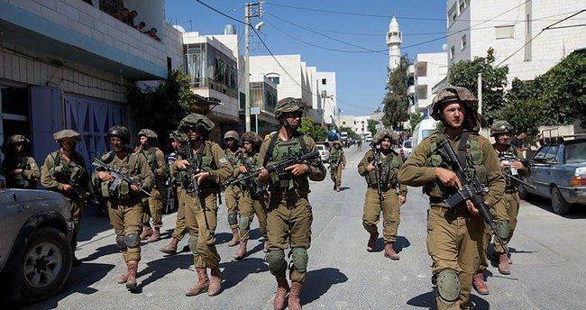 İsrail əsgərləri İordan çayının qərb sahilində iki fələstinlini saxlayıb