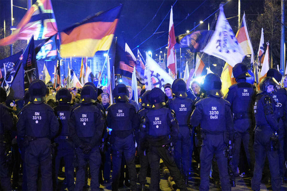 Bild: Almaniyada Amerika əleyhinə keçirilən aksiya polislə toqquşma ilə başa çatıb