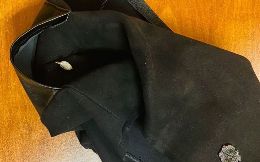 Həbsdə olan övladına narkotik keçirmək istəyən qadın saxlanılıb